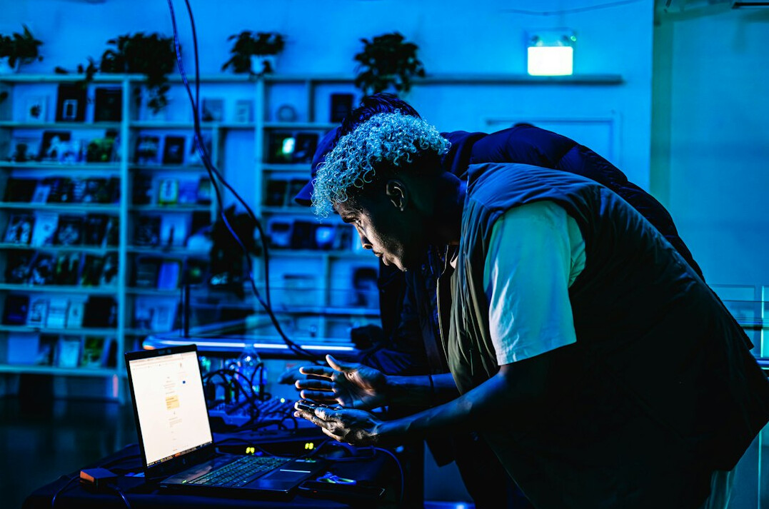 forensic expert analyzing laptop