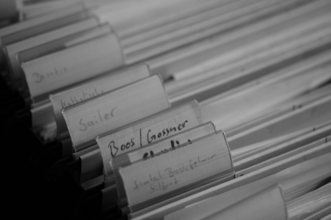 detective reading case files